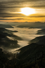 Poster - sunset in the mountains with fog