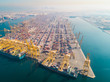 © AmazingAerialAgency - Aerial view of cargo port full of containers, Dubai, UAE