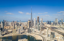 Aerial View Of Dubai Creek And Burj Khalifa Tower In Background, U.A.E.