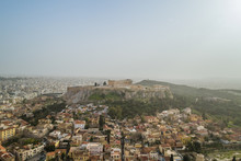 Aerial View Of Acropolis Of Athens, Ancient Citadel Located On A Rocky Outcrop Above The City Of Athens