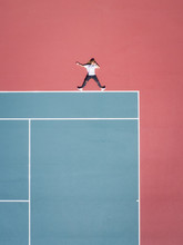 Aerial Concept Of A Person On A Tennis Court.