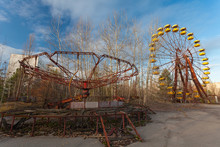 Abandoned Lunapark, Carousel And Ferris Wheel In Pripyat