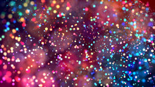 Cloud Of Multicolored Particles In The Air Like Sparkles On A Dark Background With Depth Of Field. Beautiful Bokeh Light Effects With Colored Particles. Background For Holiday Presentations. 63