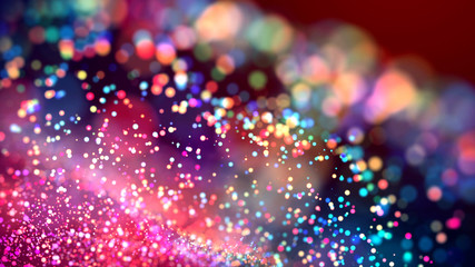 cloud of multicolored particles in the air like sparkles on a dark background with depth of field. beautiful bokeh light effects with colored particles. background for holiday presentations. 94