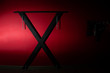 © NVB Stocker - SM cross or Andreaskreuz is used in the BDSM scene on red background