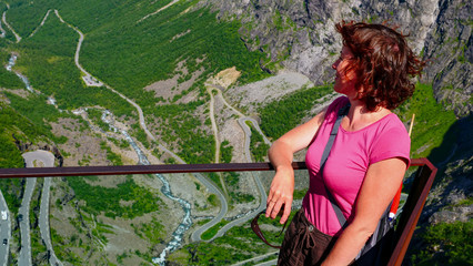 Poster - Tourist woman on Trollstigen viewpoint