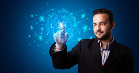 Poster - Man touching hologram screen displaying keys and locks
