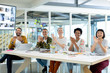 © WavebreakMediaMicro - Business people clapping hands while sitting in the meeting at the conference room