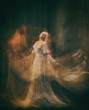 © kharchenkoirina - Slave, servant of darkness ... Queen albino. A blonde girl, like a ghost, in a white vintage dress, in a black room, a gothic, artistic photograph of a sorceress and a magician. Mary Magdalene