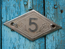 House Number Five. Old Vintage Number Five Door Plate On Old Blue Wooden Door