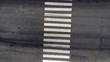 Pedestrian crosswalk zebra with no people, aerial, top view