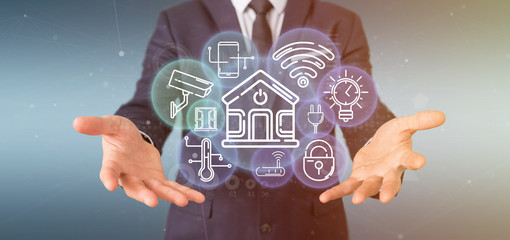 Poster - businessman holding smart home interface with icon, stats and data 3d rendering