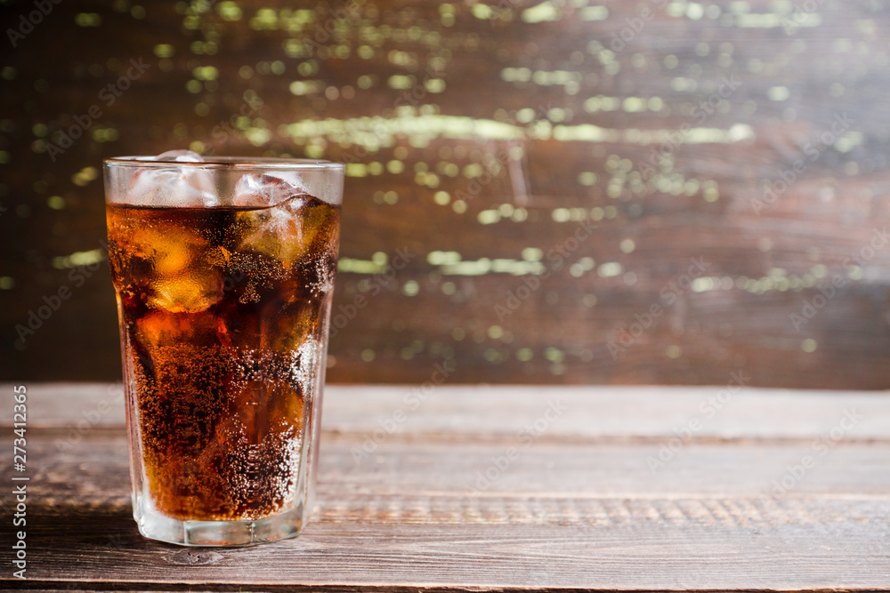 Refreshing cold cherry cola on the wooden background. Selective focus. - obrazy, fototapety, plakaty 