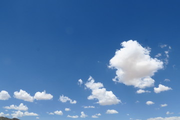 Wall Mural - Nuages blancs dans le ciel bleu