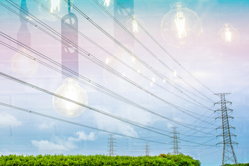 Transmission line of electricity to rural field, Electricity pole on agriculture area, High voltage electricity pole on bright sky clouds background, Electricity tower with nature landscape