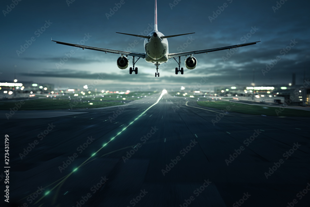 Flugzeug landet bei Nacht - obrazy, fototapety, plakaty 