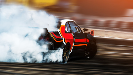 Car Drifting by professional driver at track circuit.