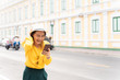© chajamp - Happy tourist woman used smart phone for searching the street locations