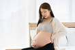 © Rapeepat - Back pain of pregnant mothers Must receive advice from a hospital with a specialist doctor By controlling the body weight according to the specified criteria And practice sitting position correctly