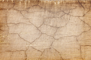 Wall Mural - beige background texture of old cracked wall closeup