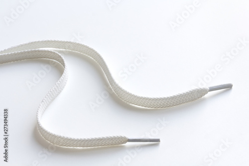 unbound white shoe laces on white background Tableau sur Toile