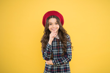 Teenage fashion. French fashion. Child small girl happy smiling baby. Happy childhood. Pure beauty. Kid little cute fashion girl posing with long hair and hat. Fashion girl. Fashionable accessory