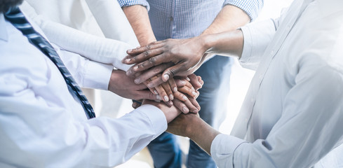 Fototapete - Stack of hands. Unity and teamwork concept.