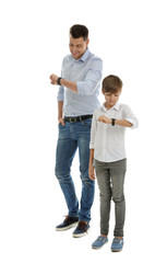 Sticker - Portrait of dad and his son checking time isolated on white