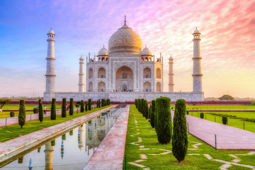 Fototapete - Taj Mahal Agra with moody sunrise sky. A UNESCO World Heritage site at Agra India