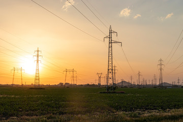 Sunset Landscape of High-voltage power lines in the land around city of Plovdiv, Bulgaria