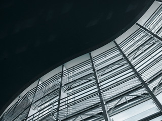 Fototapete - Architecture exterior Modern building Glass facade curve window