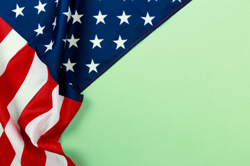 American flag on green  background  top view