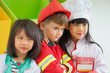 © weedezign - Three kid dress up to fireman and doctor and chef at roll play classroom,Kindergarten preschool education concept