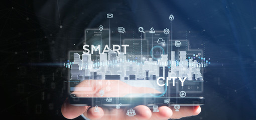 Poster - Businessman holding Smart city user interface with icon, stats and data 3d rendering