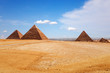 Sunny day in Giza desert, view on the Pyramids