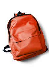 Wall Mural - Top view of red school backpack on white background.