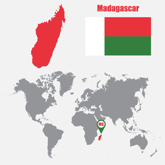 Poster - Madagascar map on a world map with flag and map pointer. Vector illustration