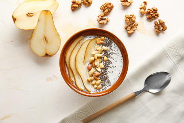 Bowl with tasty chia dessert on light table