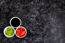 Set For Sushi Soy Sauce Ginger Wasabi With Chopstick On Stone Background