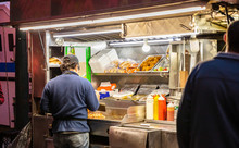 New York, Broadway At Night. Take Away Fast Food Kiosks Selling Hot Dog