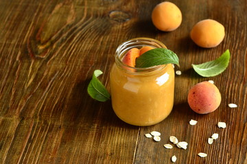 Wall Mural - Oatmeal smoothies with fresh apricots, copy space