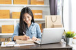 © Have a nice day  - Shipping shopping online ,young start up small business owner writing address on cardboard box at workplace.small business entrepreneur SME or freelance asian woman working with box at home