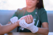 © Have a nice day  - Doctor hand Physicist physical therapy treatment patient in the clinic.Orthopedic medical exam in doctor's hospital office Partnership, traumatology and medical consultation for hand wrist injury