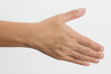 Close-up of a woman's hand and finger on white background