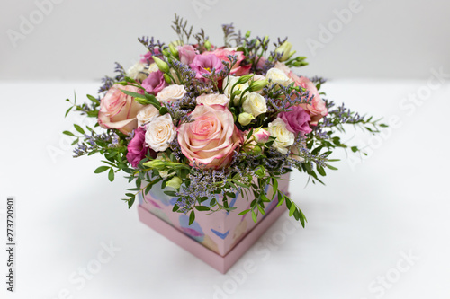 Delicate Floral Arrangement Of Roses And Live Decorations In A Square Cardboard Box Primary Color Pink On A Light Background Buy This Stock Photo And Explore Similar Images At Adobe Delicate Floral Arrangement Of Roses And Live Decorations In A Square Cardboard Box Primary Color Pink On A Light Background Buy This Stock Photo And Explore Similar Images At Adobe