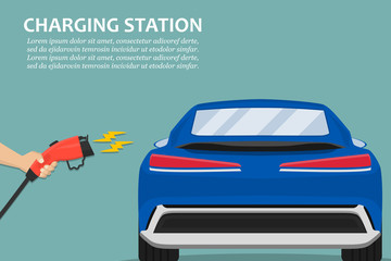 Poster - Hand holding charging plug for electric car charging station