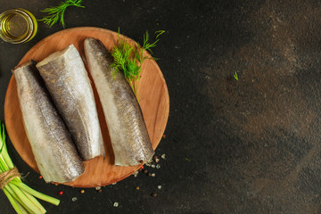 fish raw hake (set of ingredients for cooking). food background. top view. copy space