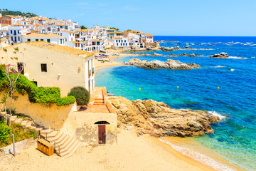 Amazing beach in Calella de Palafrugell, scenic fishing village with white houses and sandy beach with clear blue water, Costa Brava, Catalonia, Spain