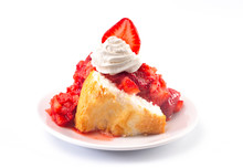 A Strawberry Short Cake Made With Angel Food Cake And Strawberry Sauce