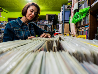 Woman looking for vinyl records